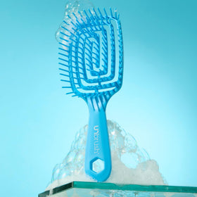 FHI Heat UNbrush Flex Detangling Brush lifestyle scene