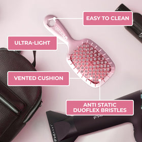 FHI Heat UNbrush Mini Detangling Brush on travel bag