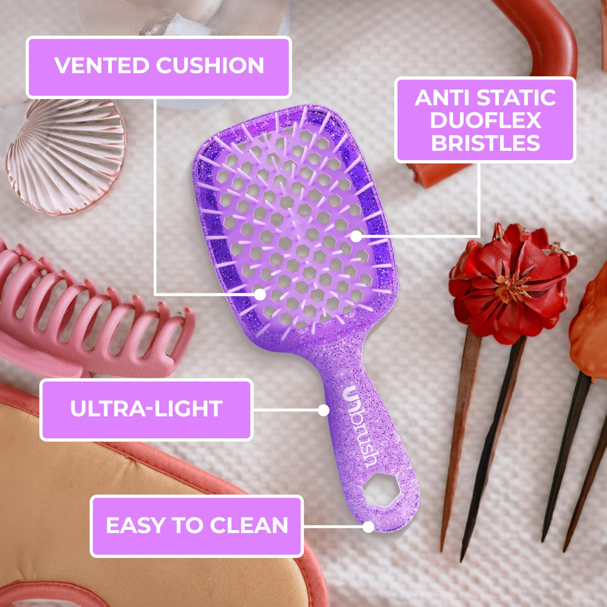 FHI Heat UNbrush Mini Detangling Brush with wet hair for demonstration
