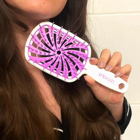 FHI Heat UNbrush Plus in use on wet hair