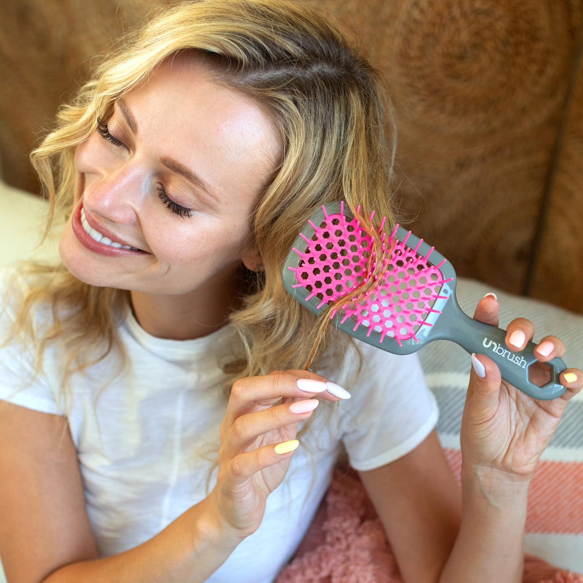 FHI Heat Unbrush Wet & Dry Detangling Hair Brush on a bathroom counter