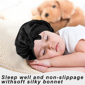 FIRSTPELLA Kids Silk Bonnets displayed with a child's toy