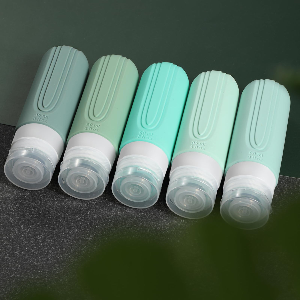 Five CHEODIN travel bottles arranged for display