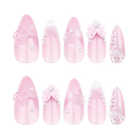 Foccna Pink Almond Press On Nails displayed with adhesive tabs