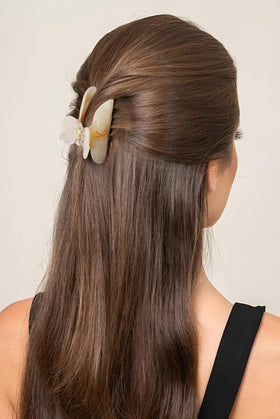 Fohufo Acrylic Letter Hair Clip N on a model's hair