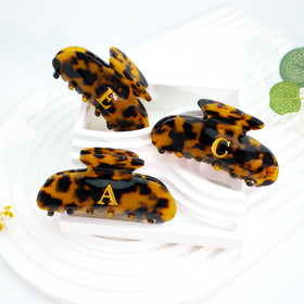 Fohufo Tortoise Shell Initial Hair Clip showing secure grip