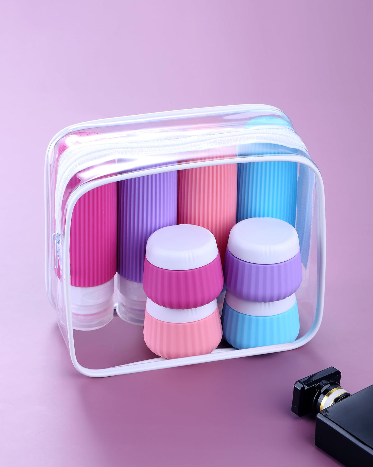 Four silicone cream jars for skincare products