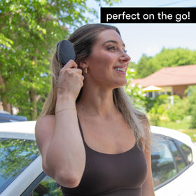 FRAMAR Mini Hair Brush Detangler in a purse for travel