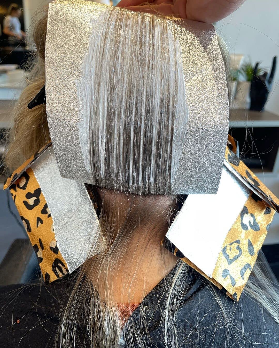 FRAMAR Party Animal Hair Foils displayed with hair coloring tools