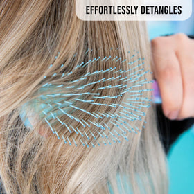 FRAMAR Purple Hair Brush Detangler in a stylish setting