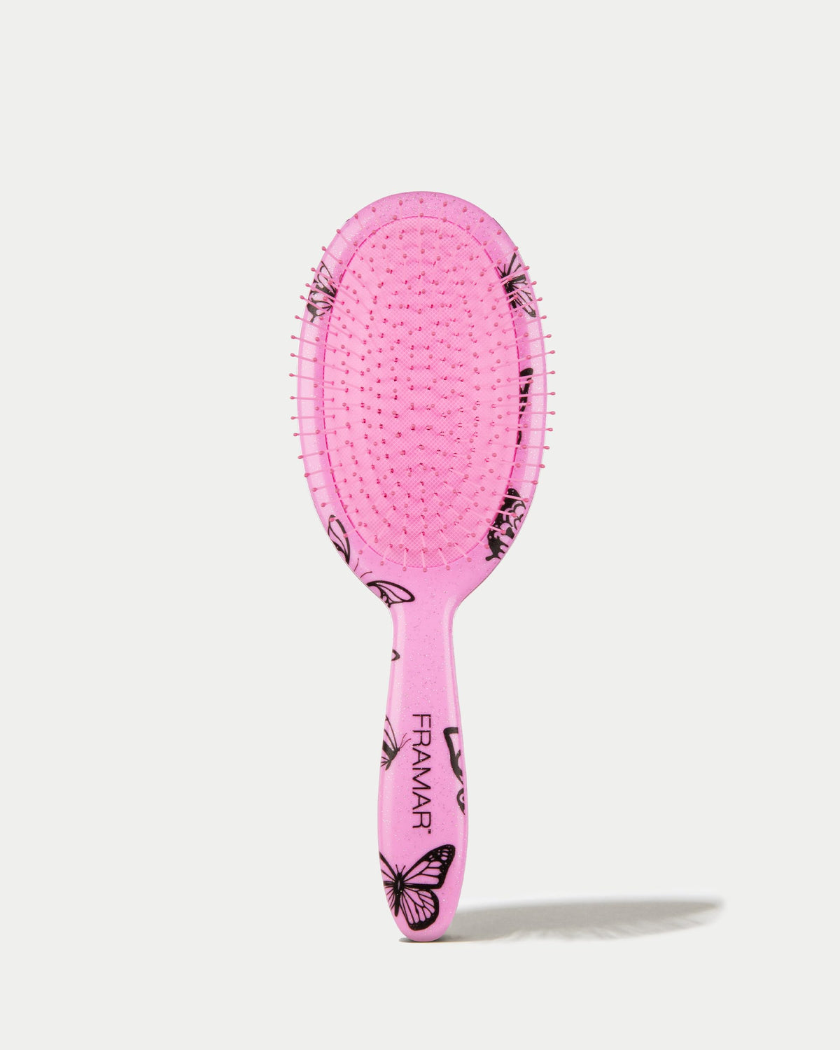 FRAMAR Y2K Print Hair Brush Detangler in a stylish setting