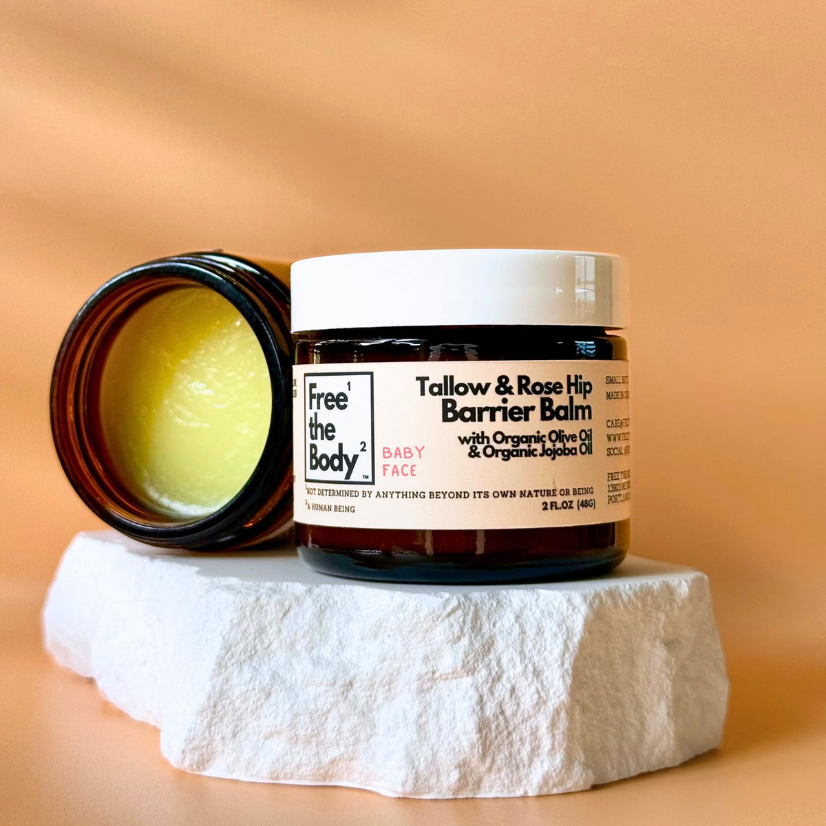 Free the Body Tallow and Rose Hip Barrier Balm ingredients displayed