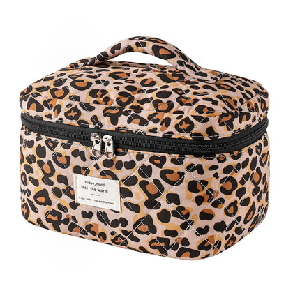 Front view of uekeboag Large Travel Quilted Makeup Bag in floral design