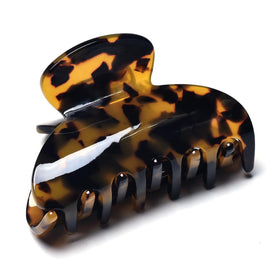 Fsmiling medium hair clip on a styled hairdo