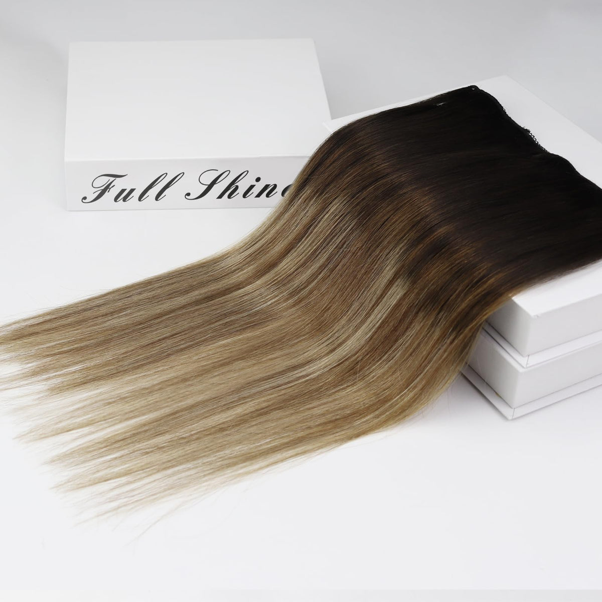 Full Shine clip-in extensions styled with natural curls