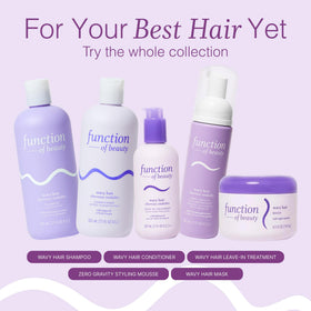 Function of Beauty Wavy Hair Shampoo and Conditioner in a bathroom setting