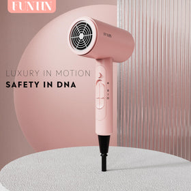 FUNTIN Hair Dryer with brush attachment in use