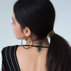 Funtopia hair ties in use during a yoga session