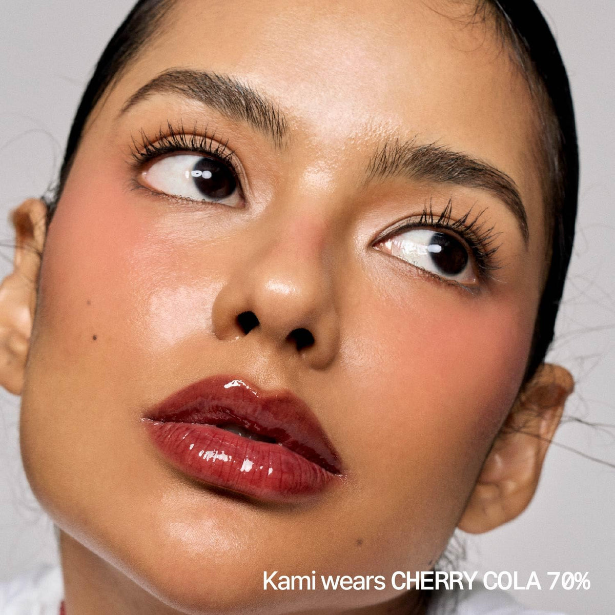 fwee 3D Voluming Gloss Cherry Cola 70% swatch on skin