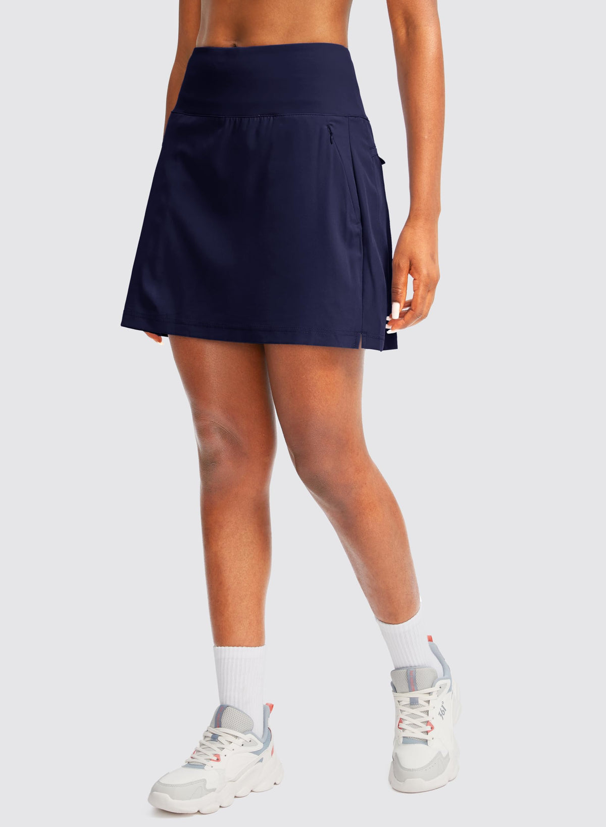 G Gradual Women's Athletic Skirt on a model during a tennis match