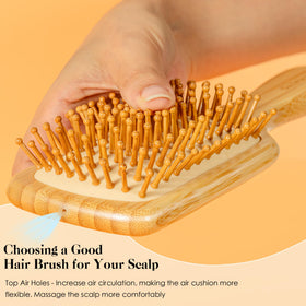 GAINWELL Bamboo Hair Brush showing bamboo bristles and cushioned design