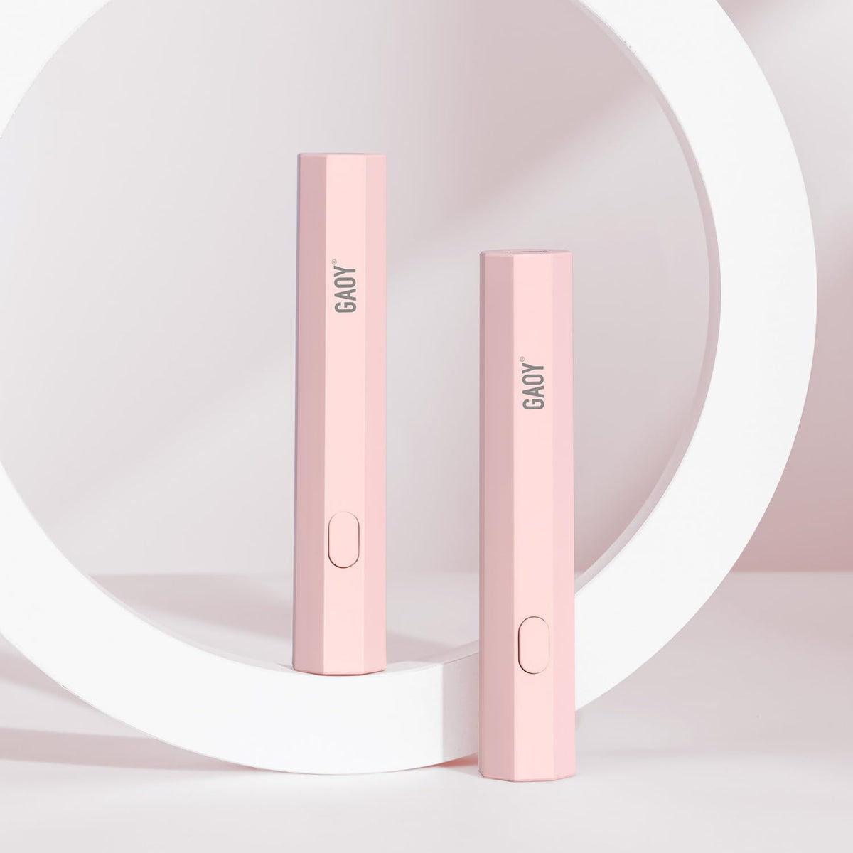 GAOY Handheld UV Light Mini Nail Lamp in pink, front view