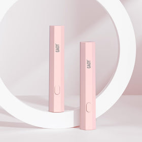 GAOY Handheld UV Light Mini Nail Lamp in pink, front view