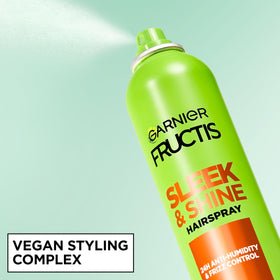 Garnier Fructis Sleek & Shine Hairspray being applied to hair