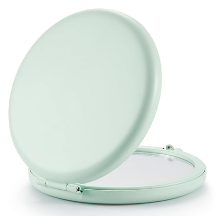 Getinbulk compact mirror cyan front view with polished surface