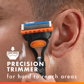 Gillette Fusion5 razor with blade refill pack on a countertop