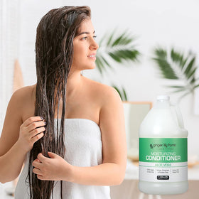 Ginger Lily Farms Conditioner 128oz on a bathroom shelf
