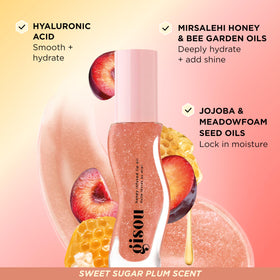 Gisou Honey Infused Lip Oil Glazed Plum in lifestyle setting