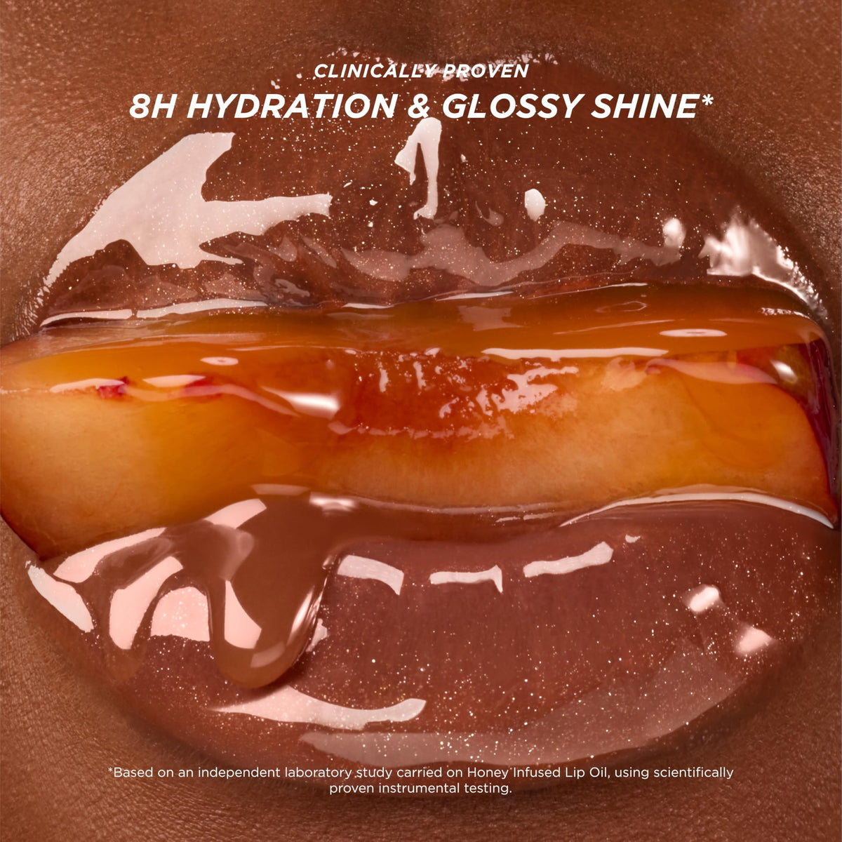 Gisou Honey Infused Lip Oil Glazed Plum texture on skin