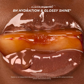 Gisou Honey Infused Lip Oil Glazed Plum texture on skin