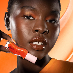Gisou Honey Infused Lip Oil Mango Passion Punch applicator close-up