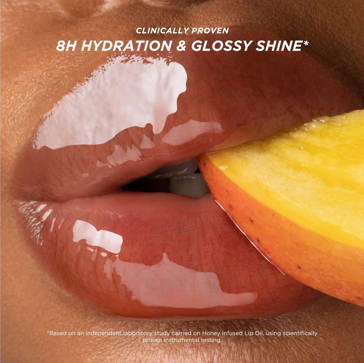 Gisou Honey Infused Lip Oil Mango Passion Punch texture on lips