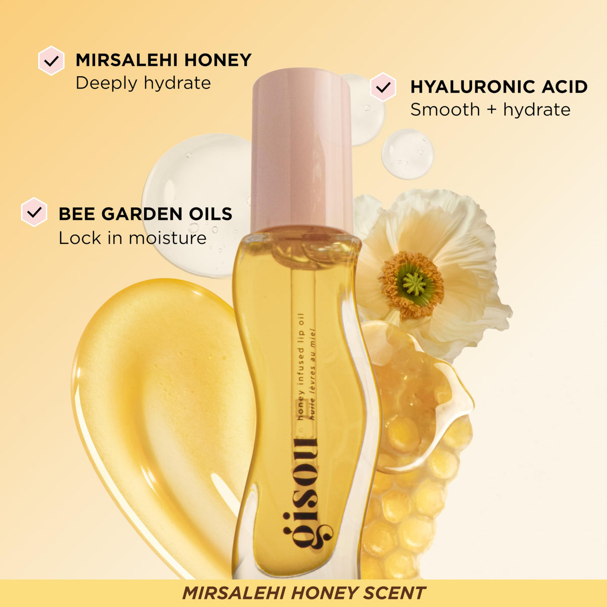 Gisou Honey Infused Lip Oil packaging on a flat surface