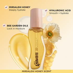 Gisou Honey Infused Lip Oil packaging on a flat surface