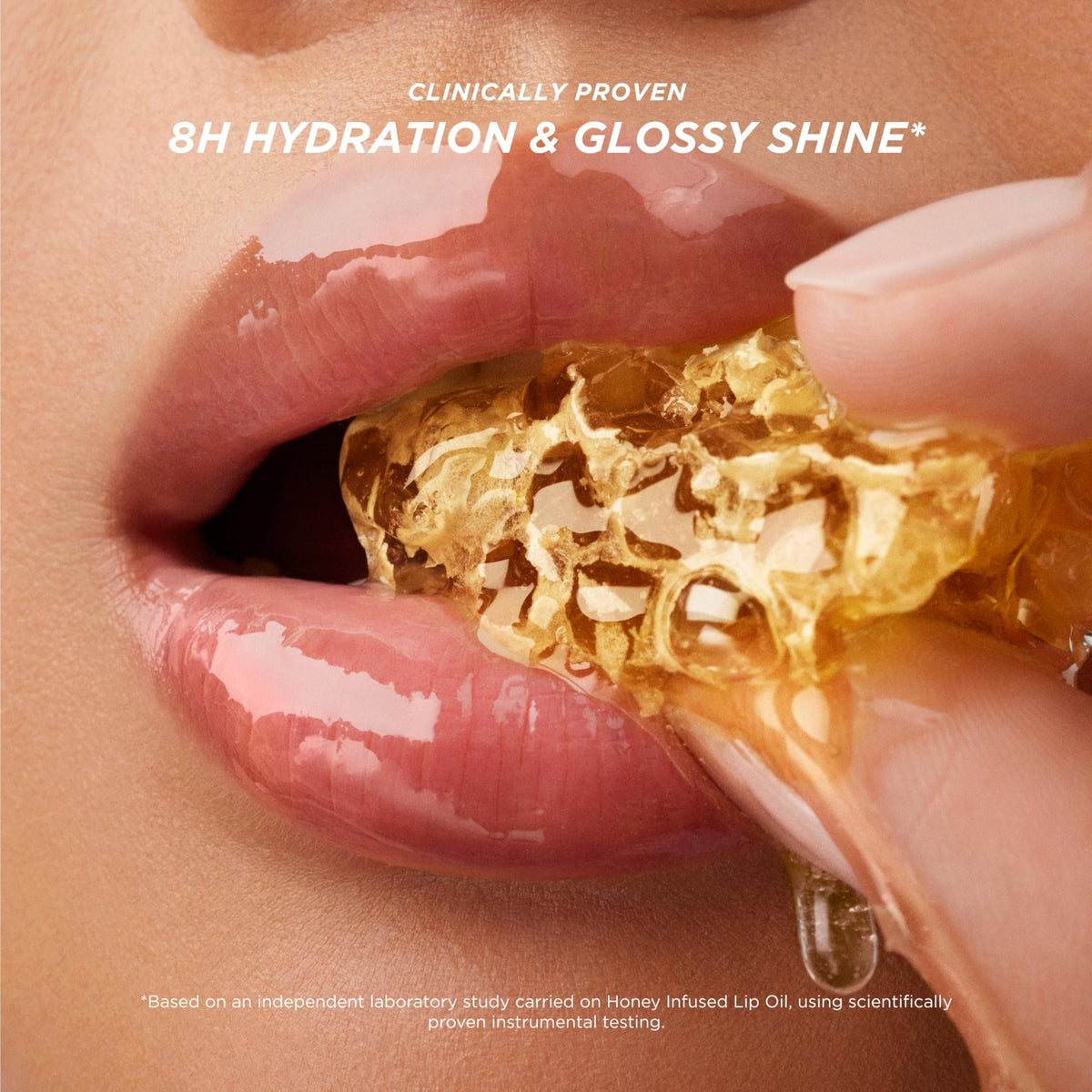 Gisou Honey Infused Lip Oil with applicator close-up