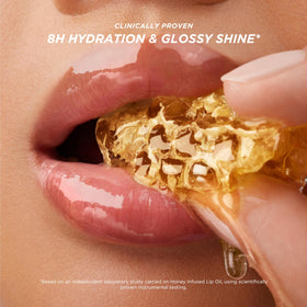 Gisou Honey Infused Lip Oil with applicator close-up