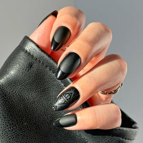 Glamnetic Deathly Hallows Press On Nails front view with packaging