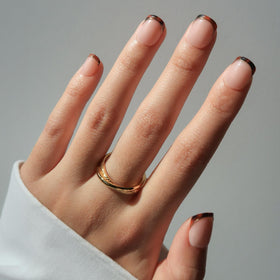 Glamnetic Press On Nails extra short glossy tortoiseshell French tips front view