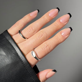 Glamnetic Press On Nails medium coffin glazed black French tip front view
