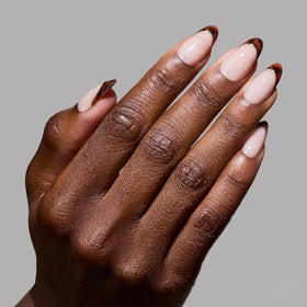 Glamnetic Press On Nails medium oval tortoiseshell French tips front view