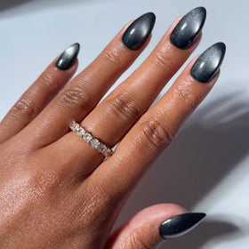 Glamnetic Press On Nails short almond black velvet cat-eye effect front view