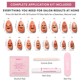 Glamnetic Press On Nails showing carved pumpkin design