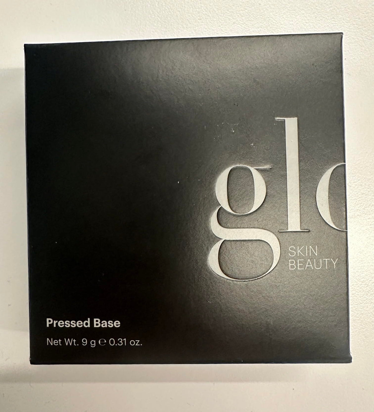 Glo Skin Beauty Pressed Base Powder Foundation Golden Light texture close-up