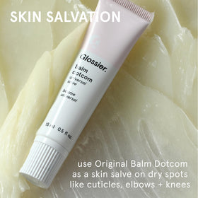 Glossier Balm Dotcom Lip Balm applied on lips, showing texture