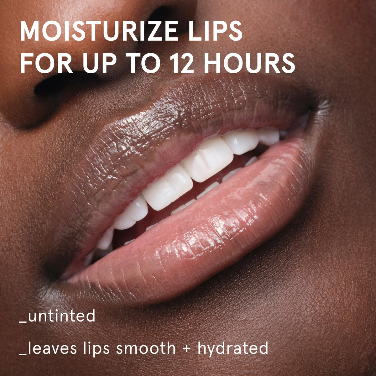 Glossier Balm Dotcom Lip Balm side view, clear untinted formula