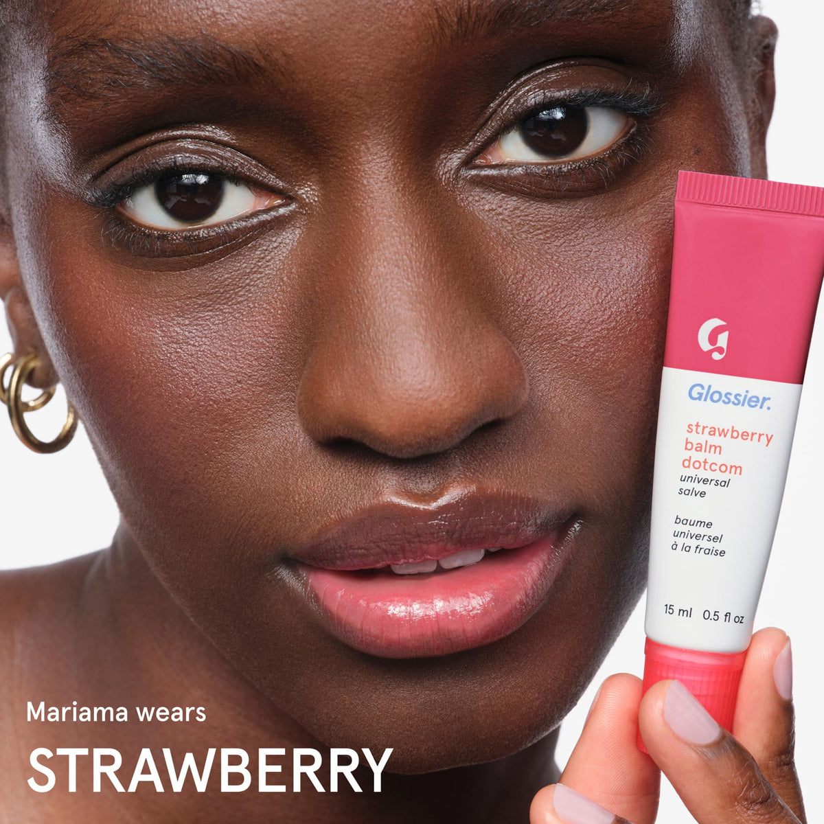 Glossier Balm Dotcom Lip Balm Strawberry Jammy Pink Tint with other beauty products